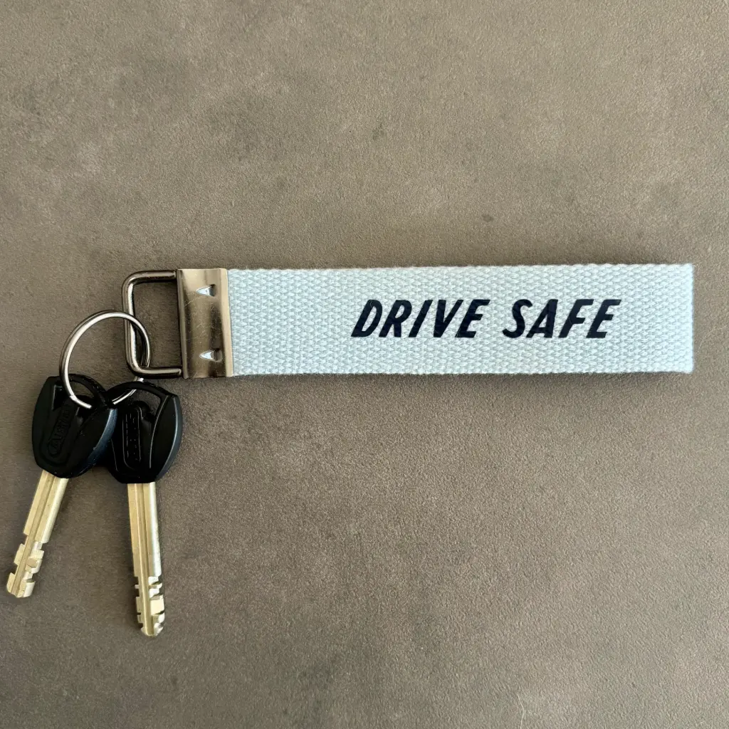 Keyring 25mm wide (grey, yes (please write the name of the song in the box))